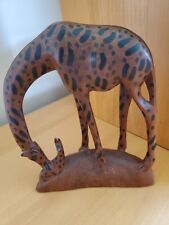 Hand carved wooden giraffe & baby figurine. Made inin Kenya. 8.5