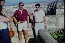 c1970's 35mm Slide, Tourists On Stone Wall, Cityscape Overview, Men polo red picture