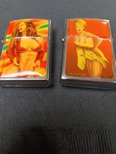 2 ORANGE YELLOW BIKINI BUSTY SEXY PINUP GIRLS LIGHTERS MINT picture