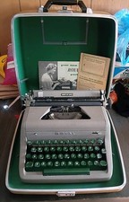 Vintage Royal Quiet De Luxe Typewriter With Papers picture