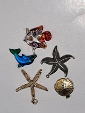 5 Vintage Sea Creature Pendants Star Fish,Sand Dollar,Fish & Dolphin picture