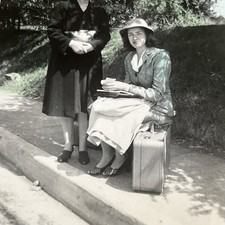 Vintage Snapshot Lady Sitting on Suitcase 1940s Waiting on Ride Sidewalk - U3 picture