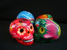 Lot of 4 Day of the Dead Sugar Skulls made of clay and hand painted picture