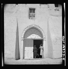 Photo:Adobe Church Entrance 1930s Pueblo Adobe Building Women picture