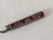 Vintage Antique Old Stock Brown Glow Beer Retractable Slide Pocket Bottle Opener picture