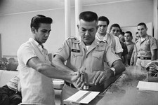 The Army Recruiting Station Miami was busy 10/23 as they proces- 1962 Old Photo picture