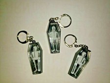 Vintage Skeleton in Coffin Keychain Charm Vending Machine Toy Lot of 3 SKU 155 picture