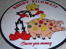 VINTAGE REDDY KILOWATT PIGGY BANK SAVES MONEY $ 12
