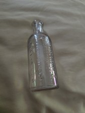 Antique Marchand’s Peroxide of Hydrogen Bottle 5¼” Embossed Medicine picture