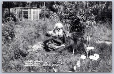 K66/ Harrison Michigan RPPC Postcard c40-50s Spikehorn bear Den Man 210 picture