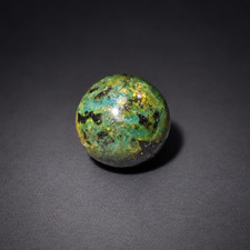 Untreated olive green blue Dominican amber sphere/ball 20mm picture