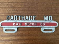 Vintage C&H Motor Co Carthage Missouri Advertising Cast License Plate Topper picture