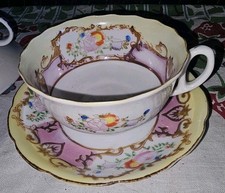 vintage, hand-painted porcelain wide-mouth tea cup and saucer set picture