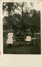 Vintage RPPC Four Young Girls Playing Outdoor Bench Seessaws Postcard picture