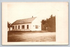 Vintage RPPC Rural Church Schoolhouse Dirt Road Evergreen Trees Postcard picture