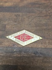 A183- Antique Shapleigh Hardware Co Diamond Edge DE Brass Advertising Emblem picture