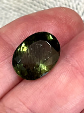 9.10ct Gorgeous Neon Green Kashmir Rutile Peridot. LOTS OF RUTILE IN THIS ONE picture