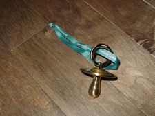 Waterford Christmas Ornament Pacifier Golden Tone picture