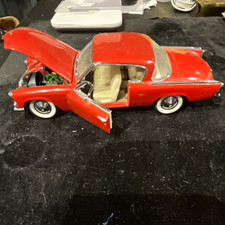 Red Vintage Diecast Model Car with Opening Hood and Opening Doors picture