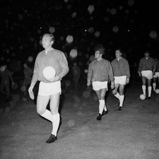 England captain Bobby Moore followed out onto the pitch team mate 1964 Photo picture