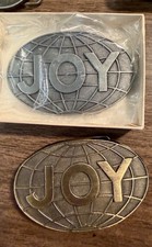 2 VTG 1970s JOY MANUFACTURING COMPANY PROMOTIONAL BELT BUCKLE Brass & Pewter picture