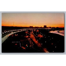 Vintage Toronto Lakeshore Blvd and Lake Ontario Dawn Skyline Postcard picture