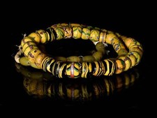 A Strand of Antique Venetian and Bohemian African Trade Beads in Yellow hues (02 picture