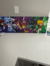 a Yu-Gi-Oh anime wall canvas/poster featuring Yugi, Kaiba, and Joey picture