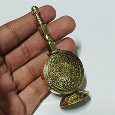 Handcrafted Egyptian brass kohl bottle with intricate Ottoman style engraving. picture