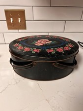 vintage tin with handles and rose pattern picture