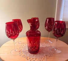 A vintage Pier 1 ruby red cut-to-clear decanter and wine glass set. picture