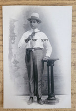 1900S REAL PHOTO POSTCARD LATINO MAN HOLDING PISTOL WEARING FEDORA HAT OUTLAW ? picture