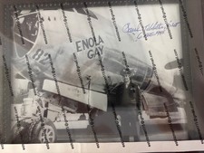 PHOTOGRAPH OF THE ENOLA GAY & PILOT PAUL TIBBITS (AUTOGRAPHED). picture