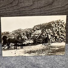 RPPC Tigerton Lumber Co. Aniwa WI Logging Log Pile Horses Lumberjacks Postcard picture