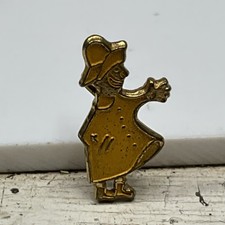 Vintage Peter Storm Yellow Rain Coat Enamel Pin Badge Rare Retro picture