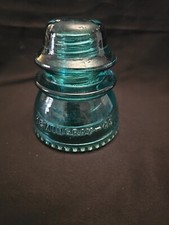 Pre-Owned Antique Hemingray-42 Green Glass Insulator picture