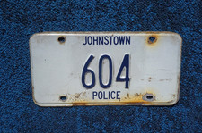 Vintage JOHNSTOWN New York POLICE License Plate # 604 picture