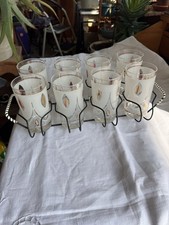 A Set Of Vintage Glasses And Holder picture