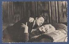 Beautiful guy and girl lying in bed, couple in love. Soviet Vintage Photo USSR picture