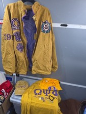 ​Omega Psi Phi Fraternity Mega Lot - Jacket, Crewneck, T-Shirt, Hat & Jewelry picture