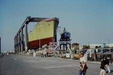 c1970's Kodachrome 35mm Slide, Zapata Courier Ship Launching Dry Dock yellow picture