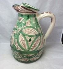 Vintage pottery jug, pitcher. Green, brown picture