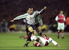 Luis Enrique of Barcelona evades challenge from Arsenal's Tony Ada- Old Photo picture