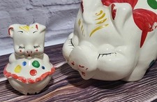 2 Anthropomorphic Piggy Banks 13
