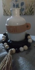 Small white VASE w/leather strap, Wooden Beads and Vase Holder picture