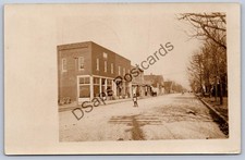 JH23/ Delphos Ohio RPPC Postcard c1910 Main Street Stores 45 picture