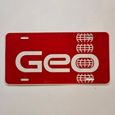 Vintage GEO License Dealer Plate Booster Metal - Metro Storm Prism Tracker picture