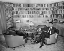 Canadian actor Glenn Ford sits a chair study home Beverly Hills Ca- Old Photo picture