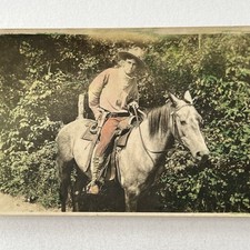 Vintage Tinted Snapshot Photograph Handsome Cowboy Horse Saddle Gun Wild West picture