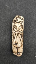 THE MINIATURE COSMIC TRAVELERHelmeted Figure • Fractal Face • Ojuelos Mystery picture